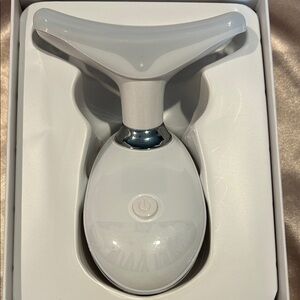 Ergonomic White Facial Massager